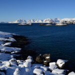 Snowy rocks and islands, and Lofoten